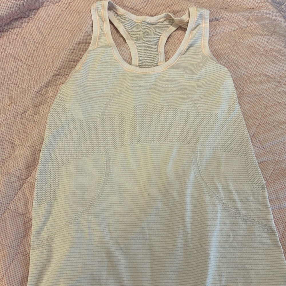 Pink lululemon swiftly tech tank top